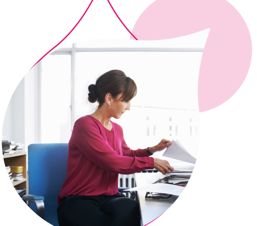 pink acquia droplets with an image of a woman in red on a computer